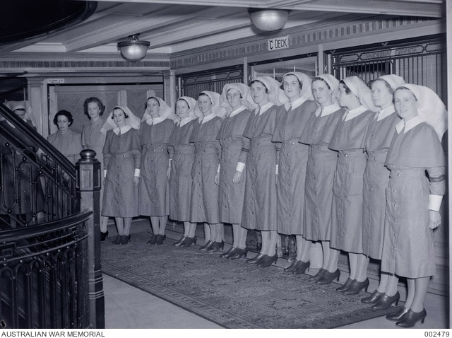 8173520 Nursing sisters awaiting inspection by Governor LOrd and Lady Wakehurst aboard Manunda in Sydney 9 August 1940. AWM.jpg