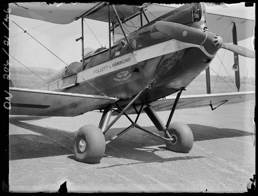SLNSW_FL21233835 Adastra Flying School biplane at Mascot 8 January 1931 by Sam Hood. Courtesy SLNSW LR.jpg